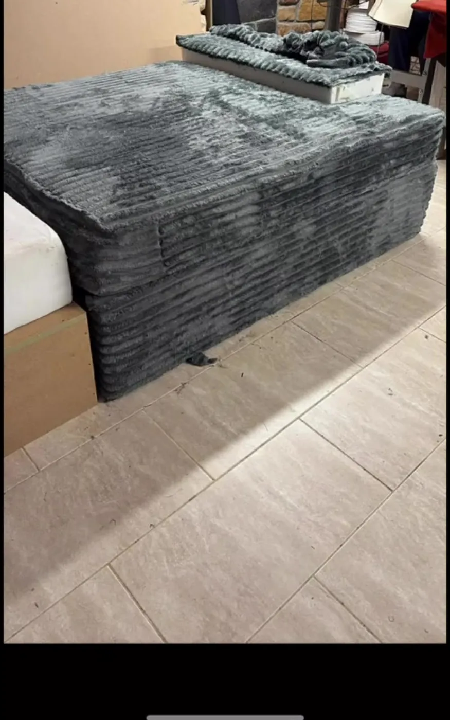 Bespoke sofa built and covered in grey cord fabric